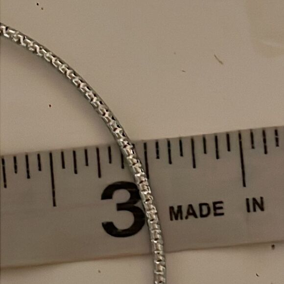 7.5” stackable polished silver tone bangle bracelet w/32 prong set crystals - Picture 11 of 12